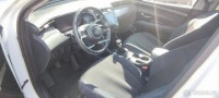 Hyundai Tucson 1,6   bíly, T-GDI-benzin, 2023